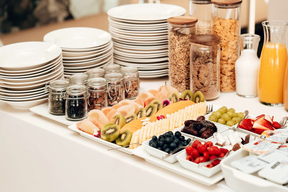 Breakfast buffet with fresh fruit, juices and granola